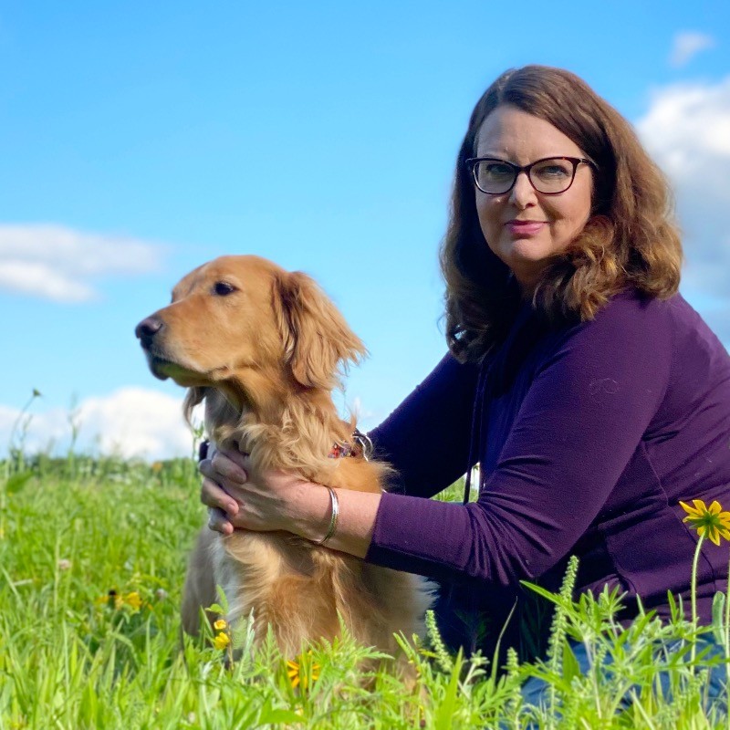 Dr. Longtin and her Golden Retriever Bubbles